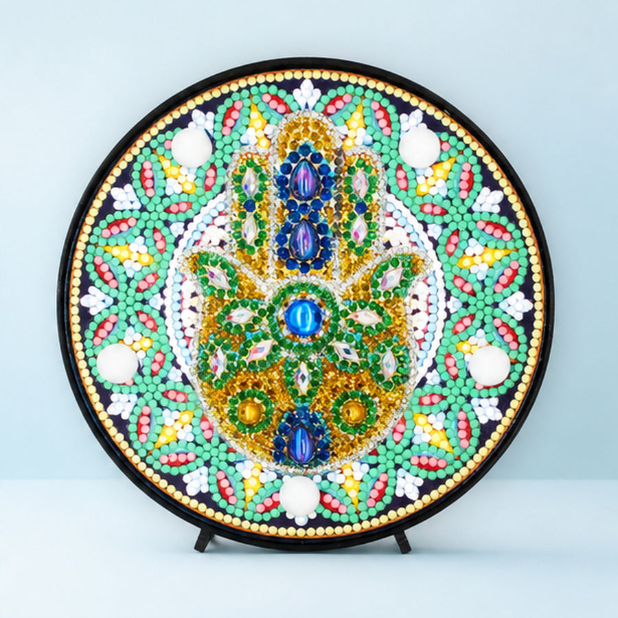 Diamond Painting Rond Lampje Hamsa Hand Mandala op een lichtblauwe achtergrond