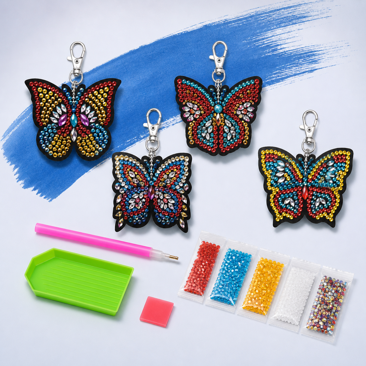 Inhoud van de vierdelige diamond painting vlindersleutelhangerset